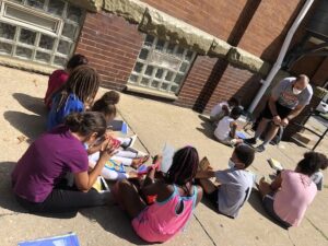 Kids playing on the sidewalk