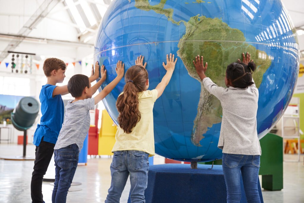 Kids at a globe