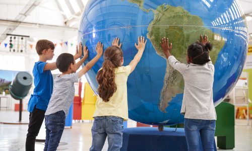 Kids at a globe